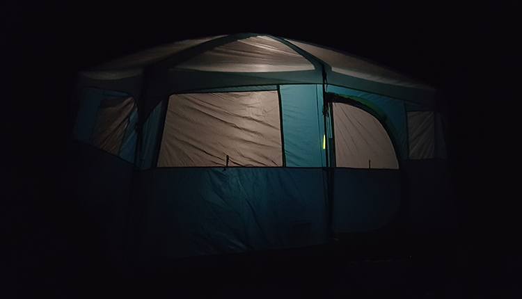 tent lit with a lantern